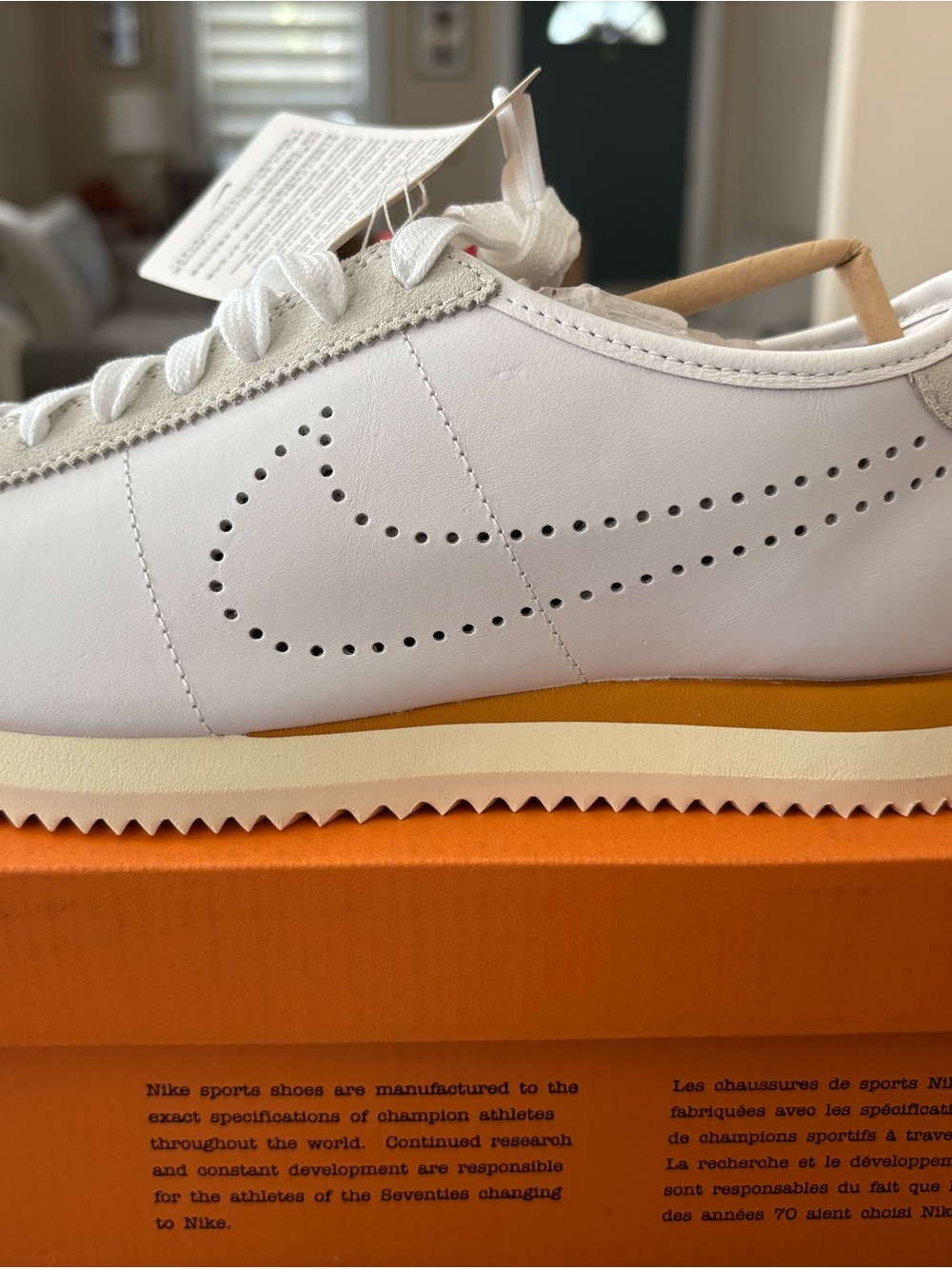 Nike White Perforated Swoosh Low-Top Sneaker with Tan Accent